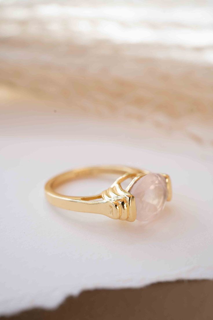 D E T A I L S — METAL: Gold Plated 18k: Gold plated jewelry has a layer of gold covering a base metal. — Stone: Rose Quartz. 💎 The gemstone is The Rose Quartz. ✦Rose Quartz, the crystal of Unconditional Love, it's considered a stone of the heart. It carries a soft feminine energy of compassion and peace, nourishment and comfort. 💎 The natural gemstone can vary in color, shape or size. BACK SIDE OF THE RING: The metal band of our rings is never completely covering the gem from the back side, so Gold Crystal Ring Tarnish Resistant, Gold Tarnish Resistant Crystal Ring, Gold Oval Stackable Crystal Ring, Gold Oval Crystal Ring Stackable, Gold Oval Crystal Ring, Stackable, Gold Crystal Gemstone Promise Ring, Gold Plated Gemstone Crystal Ring, Gold-plated Gemstone Crystal Ring, 14k Gold Tarnish Resistant Crystal Ring