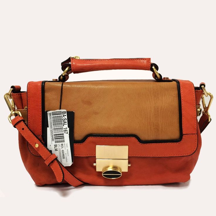 Description: Color: Tangerine Type Of Material: Leather Type Of Trim: Tan Leather Color Of Hardware: Gold Tone Type Of Closure: Top Flap Type Of Handle: Top Handle With 2 “Drop Type Of Strap: Detachable Strap With 18.5” Drop Exterior Details: - Treesje Logo Engraved Pinch Lock Interior Information: - Fully Lined - Single Zip Pocket - Two Slip Pockets Condition: - Light Scuff Marks On Hardware - Slight Areas Of Discoloration On Bags Exterior Chic Orange Leather Shoulder Bag, Orange Leather Shoulder Bag With Gold-tone Hardware, Cognac Flap Bag For Formal Occasions, Brown Flap Bag For Shopping, Chic Caramel Shoulder Bag With Leather Lining, Classic Orange Top Handle Satchel, Orange Office Satchel With Detachable Strap, Chic Orange Leather Bags, Cognac Leather Satchel With Gold-tone Hardware