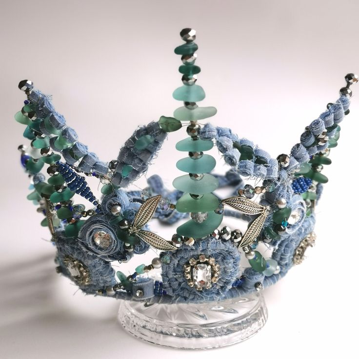 Glorious mermaid crown LISA. A unique denim crown handcrafted by me. Made in Latvia with love.  The contrast of denim roughness, shimmery glass beads and natural sea glass is a stunning and contemporary combination. The crown will compliment and enhance any your festival outfit look.  It is adjustable and ties on its back, so it will fit to any size of head. The crown is set on solid base. All components and beads are  tightened together with wires. You can use it in any weather conditions and not to be  worried something will fall or peel off. If needed, the crown can be gently washed with soft brush and soap. You will receive LISA beautifully boxed and wrapped. Glass Crown, Unique Crown, Mermaid Crown, Hag Stones, Magic Stones, Mermaid Dreams, Latvia, Wedding Hair Accessories, Festival Outfit