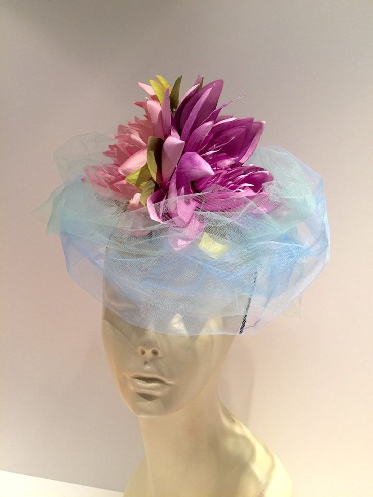 "Lily Fascinator- Monet- Flower Fascinator- Water Lilies- Mad Hatter Party- Tea party- Kentucky Derby- Wedding-Garden Party Hello,       This fascinator has 2 water lilies that are approx. 7 \". It has blue and green netting that is approx. 5\" high. It is attached to a satin covered skinny headband and is adjustable. It's very comfortable and will fit any size head. Other Colors Combinations! Flowers: Blue Ivory Pink Peach Yellow Lime  Fuchsia   Net: Blue/green (shown), White, Ivory, Pink ----- Whimsical Adjustable Fascinator For Spring, Flower-shaped Fascinator With Handmade Flowers For Garden Party, Summer Flower Fascinator For Formal Occasions, Handmade Flower Fascinator For Garden Party, Spring Flower Fascinator For Formal Occasions, Handmade Flower Shape Fascinator For Garden Party, Summer Formal Flower Fascinator, Spring Garden Party Fascinator With Curved Brim, Summer Party Flower Headband