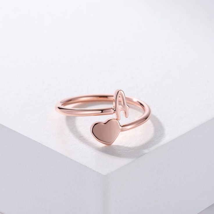 This ring is certain to be enjoyed. Created for special occasion, showcases a letter of your choice, show your love for the important people in your life with this charming Initial Heart ring. Material : 925 sterling silver Finish : 18k Gold - Rose Gold - Sterling silver Dainty Initials Jewelry For Promise, Rose Gold Open Heart Ring Gift, Adjustable Gold Heart-shaped Initial Ring, Adjustable Gold Heart Initial Ring, Dainty Initial Ring For Promise Occasions, Rose Gold Sterling Silver Initial Open Ring, Dainty Rose Gold Sterling Silver Initial Ring, Rose Gold Sterling Silver Initial Ring For Wedding, Rose Gold Sterling Silver Heart Ring For Gift