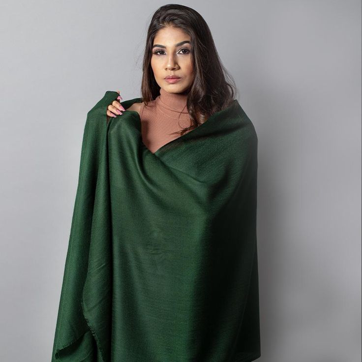 .col{ float: left; width: 25%; } .row1{ text-align: center; } OMVAI presents to you the premium quality of authentic Solid Pashminas collection where every single piece comes from the craftsmen of Kashmir. These shawls are woven using fine cashmere and are crafted with utmost finesse and are super soft. It is warm, cozy and feathery light. The versatility of these luxury Cashmere is unisex and can be worn in all seasons. It adds elegance and grace to your attire and will compliment your outfits Elegant Handloom Pashmina Shawl, Handloom Pashmina Shawl For Winter, Traditional Green Handloom Scarf, Traditional Green Handloom Scarves, Green Pashmina Scarves For Winter, Green Pashmina Winter Scarf, Traditional Green Winter Shawl, Elegant Green Pashmina Shawl, Green Pashmina Shawl Scarf