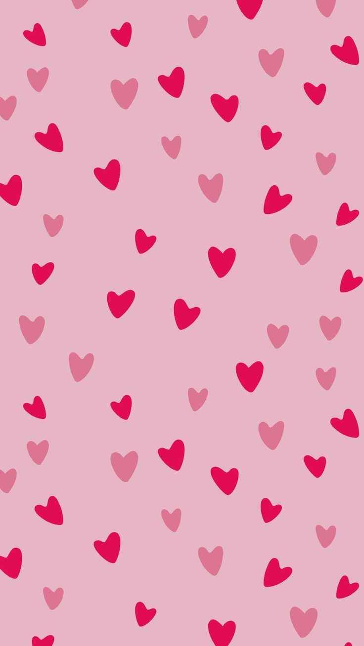 a pink background with lots of hearts on it