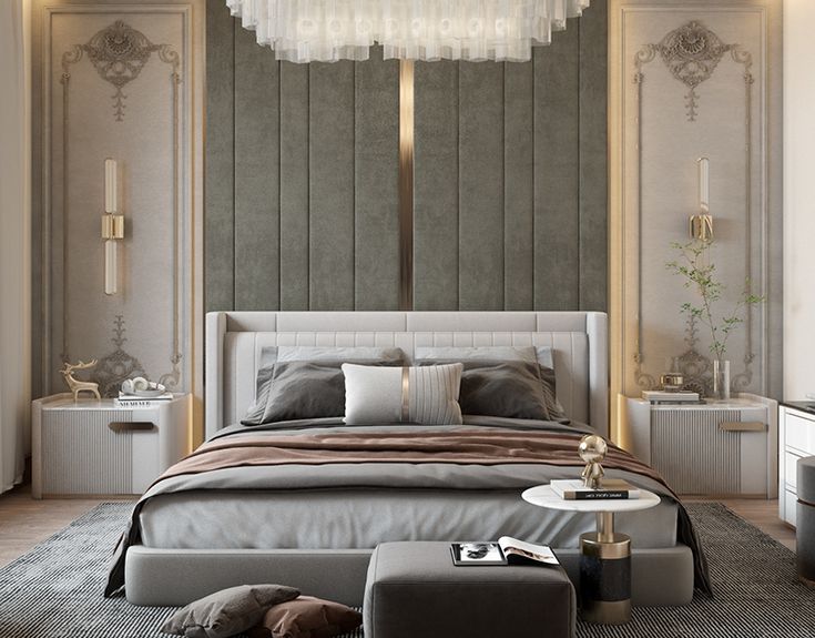 a bedroom with a large bed and chandelier hanging from the ceiling