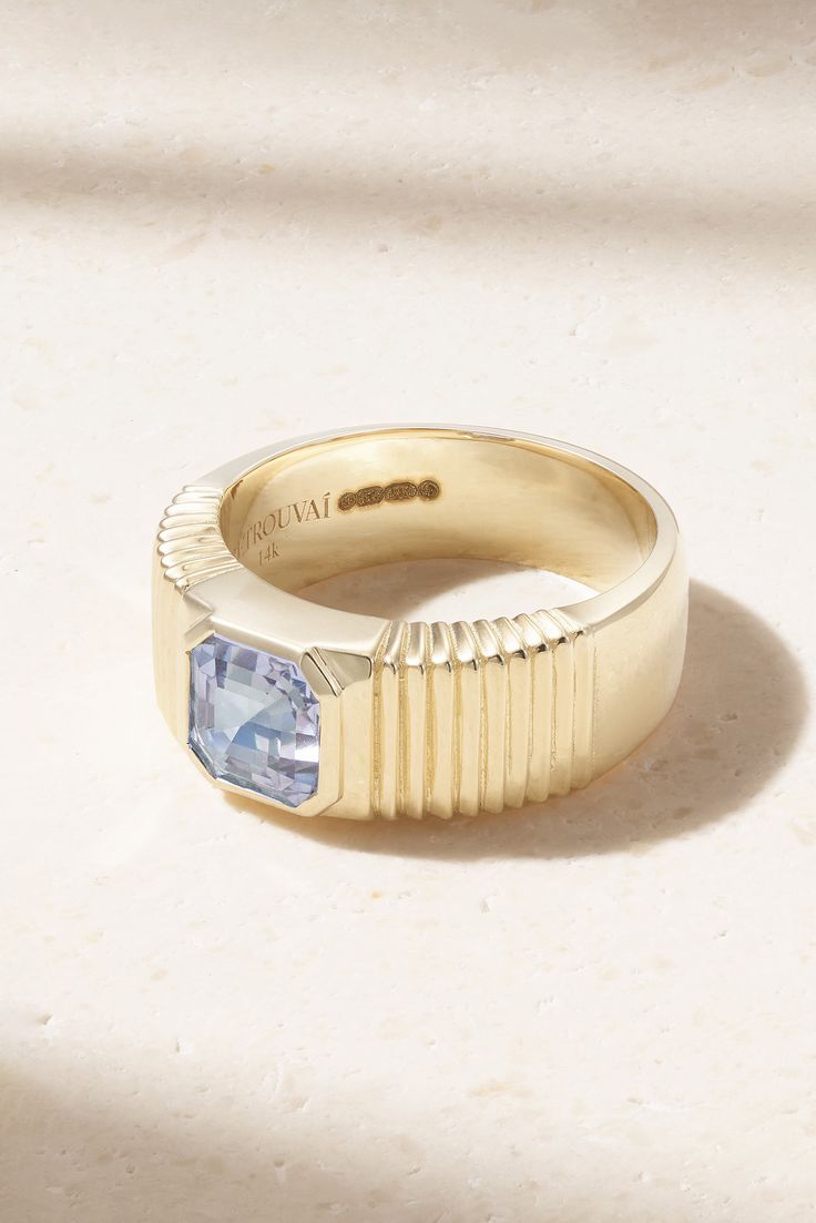 Inspired by a love of vintage treasures, Retrouvaí's colorful jewelry is handmade in Los Angeles using time-honored techniques, so pieces like this one-of-a-kind ring are destined to become modern heirlooms. It's handcrafted from 14-karat gold and has an artfully carved band that emphasizes the vibrant sapphire at the center. Timeless Sapphire Ring For Gift, Timeless Sapphire Ring As Gift, Luxury Tanzanite Jewelry With Polished Finish, Fine Jewelry 14k Gold Baguette Cut, Yellow Gold Baguette Cut Jewelry Gift, 14k Gold Baguette-cut Fine Jewelry, 14k Gold Baguette Cut Fine Jewelry, Timeless 14k Gold Baguette Cut Jewelry, Luxury Recycled Gold Jewelry For Anniversary