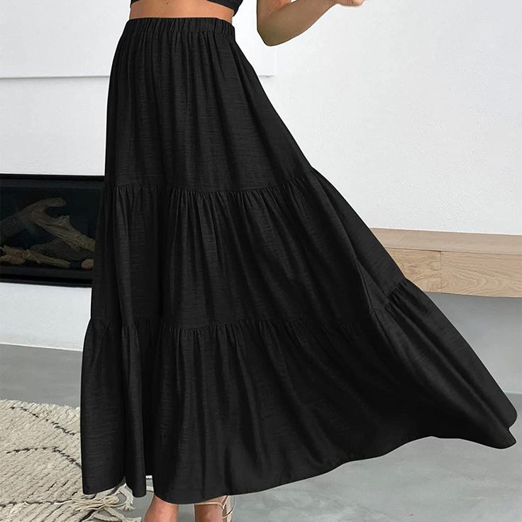 Black Cotton Blend Swing Maxi Skirt with Pockets Black Skirted Bottoms, Black Relaxed Maxi Skirt, Relaxed Black Maxi Skirt, Black Tiered Maxi Skirt With Lining, Black Tiered Maxi Skirt With Lined Detail, Black Tiered Maxi Skirt For Spring, Black Flared Flowy Maxi Skirt, Black Flowy Flared Maxi Skirt, Casual Black Tiered Skirt