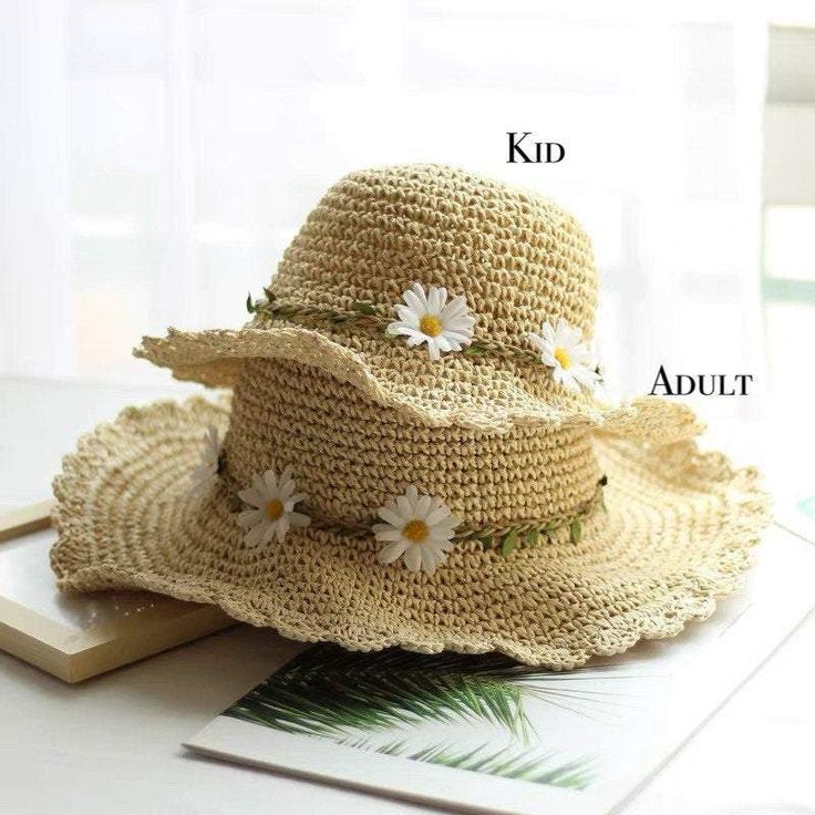 Stay stylish and protected with our matching family straw hats. Made from lightweight, breathable natural straw, these hats feature a wide, scalloped brim for excellent sun protection and are adorned with charming artificial daisies. Available in both kid and adult sizes, they are perfect for creating adorable matching outfits for beach outings, garden parties, and picnics. Enjoy comfort and whimsy with these durable, fashionable hats. Material: 100% strawSize:Adult Size: Head size 54-58cmKid Si Beach Straw Hat, Daisy Decorations, Leather Beret, Girls Sun Hat, Summer Straw Hat, Knit Beret, Girl Kid, Personalized Hats, Hat Beret