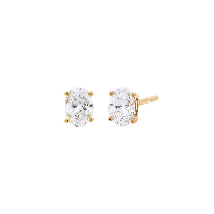 Introducing the Adina Eden Lab Grown Diamond Oval Four Prong Stud Earrings, a stunning blend of elegance and sustainability. Crafted from luxurious 14K gold and 14K white gold, these earrings feature a single oval brilliant-cut lab-grown diamond in each stud. With a color grade of G and a clarity of VS1, these diamonds offer exceptional brilliance and clarity. Available in five carat weights—0.25 CT, 0.50 CT, 1 CT, 1.5 CT, and 2 CT—these earrings cater to various style preferences. Finished with Timeless Oval Yellow Gold Diamond Earrings, Oval Yellow Gold Diamond Earrings For Wedding, 14k Gold Oval Diamond Earrings With Prong Setting, Elegant Oval Diamond Earrings In 14k Gold, Elegant 14k Gold Oval Diamond Earrings, Luxury 14k Gold Oval Earrings, Timeless Oval Brilliant Cut Earrings, Ethical 14k Gold Oval Earrings, Timeless Oval Wedding Earrings