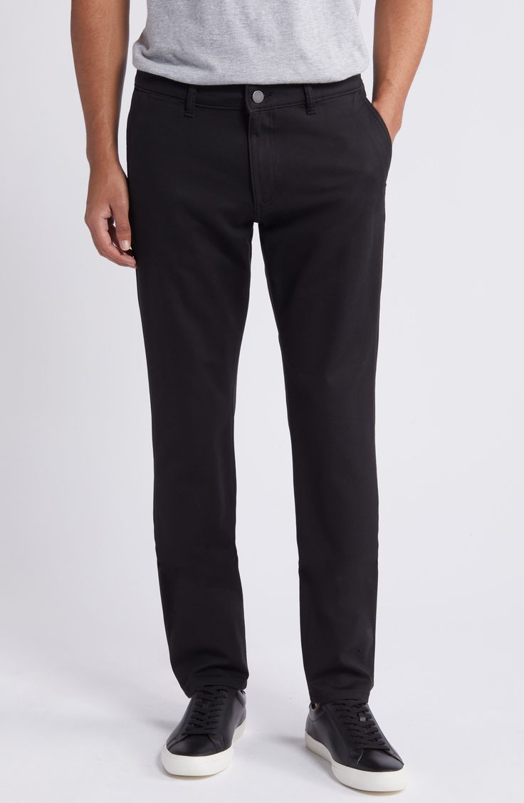 Slim and streamlined from thigh to hem, these smart-casual pants are cut from stretchy, breathable twill that looks great at work or on the weekend. 32" inseam; 14 1/2" leg opening; 10" front rise Zip fly with button closure Front slant pockets; back welt pockets 56% cotton, 40% viscose, 4% Lycra® spandex Machine wash, line dry Imported Business Casual Slim Fit Elastane Bottoms, Black Straight Chinos For Business, Black Tapered Leg Chinos For Business, Elastane Jeans For Workwear, Black Straight Chinos For Business Casual, Casual Elastane Pants With Belt Loops, Business Black Chinos With Welt Pockets, Black Chinos With Welt Pockets For Business, Slim Fit Tapered Leg Work Pants