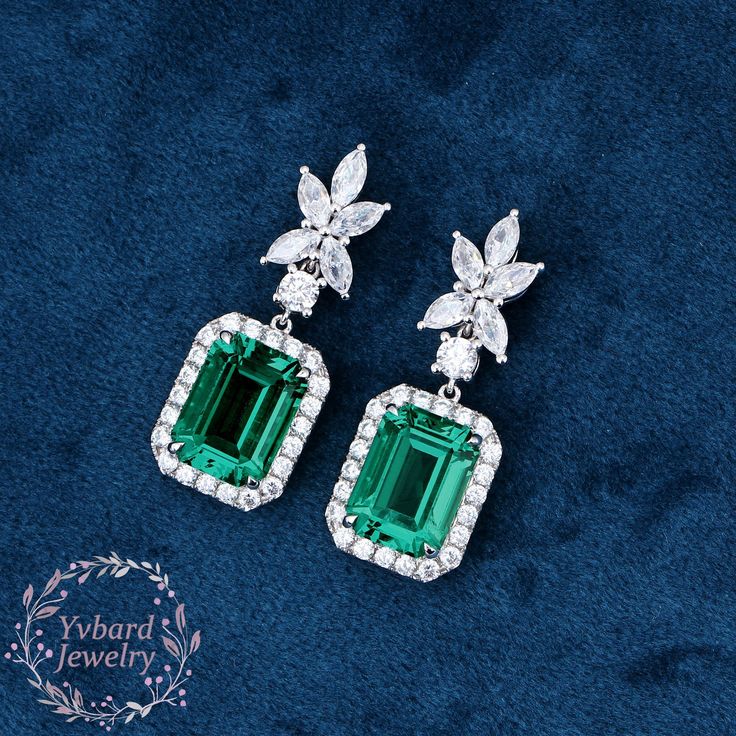 "❤Jewelry Details -Gold Type : Solid 10K Gold / Solid 14K Gold / Solid 18K Gold / Platinum (Choose One in Material Option) -Center Stone: Lab Created Emerald 7*9mm, Approximately 3.0ct*2pcs Color: Green--- 5A Clarity: VVS Cut: Emerald Cut / 3EX -Side Stone: Moissanite Moissanite Total Carat Weight: approx. 1.22ctw (a pair) Cut: Marquise Cut, Round Cut Color: D-F Clarity: VVS1 Earring Length: 25*9.5mm SKU: YE0047 ~*-*~Purchase Guarantee: - All our jewelry is handmade, and each process is refined. - 14 Day Refund Guarantee. - All our products are Free Shipping. - Free Gift Box&Packing. ~*-*~Please contact us if you need service: 1. Ring Resizing. 2. Metal Change(PT950/10k/14k/18k White/Yellow/Rose Gold). 3. Engraving ring (less than 10 letter). 4. Accept customization. We believe that our qu Luxury Green Diamond Earrings For Wedding, Emerald Drop Diamond Earrings For Wedding, Exquisite Green Diamond Wedding Earrings, Exquisite Green Diamond Earrings For Wedding, Formal Baguette Cut Bridal Earrings, Moissanite White Gold Diamond Earrings For Wedding, Elegant Baguette Cut Diamond Earrings For Weddings, White Gold Moissanite Diamond Earrings For Wedding, Wedding Drop Earrings With 17 Jewels