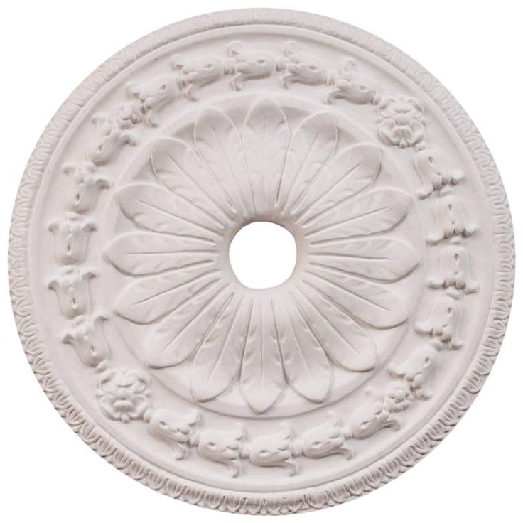 a white ceiling medallion with an intricate design