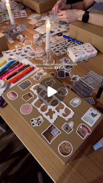 a table topped with lots of different types of stickers and paper cut out to look like gingerbreads