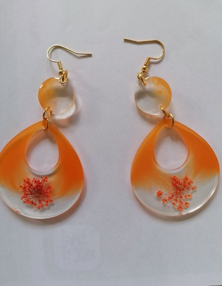 Hand made earings Orange Flower Earrings For Gift, Resin Dangle Flower Earrings With Ear Wire, Bohemian Resin Earrings With Ear Wire, Dangle Flower Earrings With Resin And Ear Wire, Dangle Flower Earrings With Ear Wire In Resin, Orange Resin Dangle Earrings, Trendy Resin Drop Earrings, Unique Flower-shaped Resin Earrings, Orange Dangle Resin Earrings