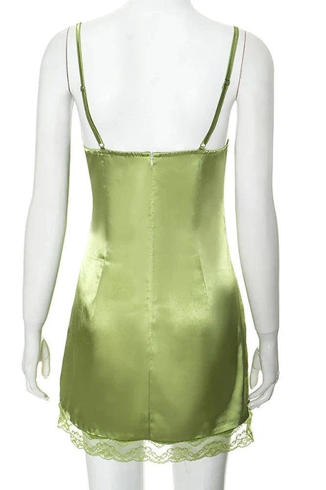 This stylish mini dress features a backless design with lace patchwork and spaghetti straps. The intricate detailing and fitted silhouette make it perfect for making a chic statement at dressy events. Elegant and eye-catching with a touch of modern flair. Details: Elasticity: High Stretch Fabric Type: POLYESTER Silhouette: Sheath Neckline: other Material: POLYESTER Material: SPANDEX Green Square Neck Mini Dress For Party, Green Mini Dress With Square Neck For Party, Elegant Club Suspender Dress For Spring, Summer Lace Trim Mini Bodycon Dress, Elegant Spring Club Suspender Dress, Summer Mini Bodycon Dress With Lace Trim, Strappy Cocktail Mini Dress, Fitted Satin Suspender Dress With Straps, Mini Length Lace Trim Slip Dress For Night Out