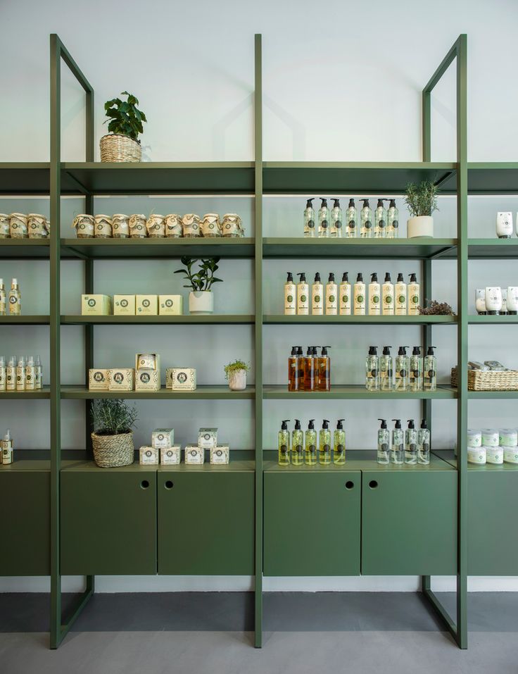 the shelves are filled with many different types of bottles and containers, all lined up against each other