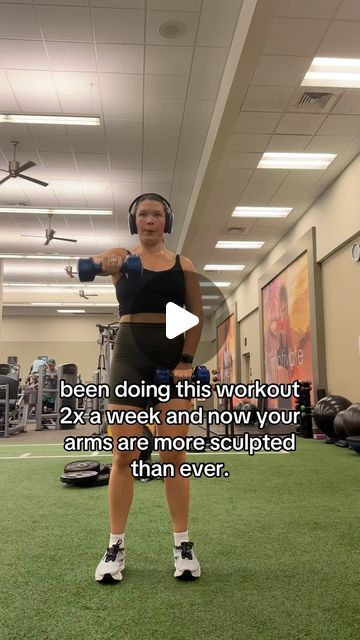 a woman is doing exercises in the gym