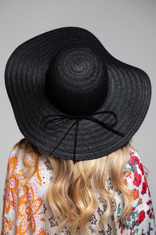 Gorgeous woven wide brim with delicate trim sun hat*100% Paper*APPROX. Circumference 22"Brim 4.5" Crown height 4" Elegant Spring Panama Hat With Upf 50+, Solid Straw Hat For Spring Beach Outings, Solid Straw Hat For Beach In Spring, Solid Color Sun Hat With Flat Brim For Summer, Black Summer Fedora, Solid Color Straw Hat For Vacation, Spring Beach Boater Hat With Wide Brim, Spring Solid Boater Hat With Flat Brim, Spring Vacation Boater Hat With Brim