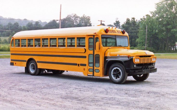 a yellow school bus parked in a parking lot