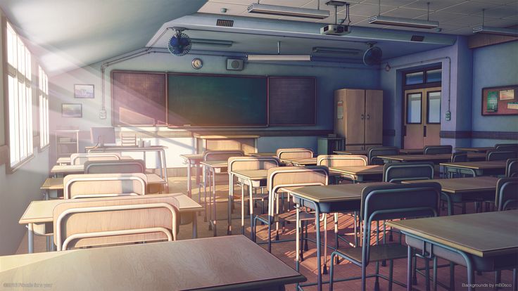 an empty classroom with desks and chairs