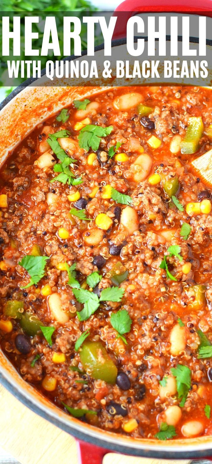 a red pot filled with chili and beans