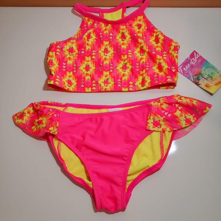 Freestyle Revolution Pink Yellow 2 Piece Bathing Suit Swim Suit Highlighter Yellow Triangles, Geometric Shapes Racerback Tank Sleeveless Bikini Long Crop Top Shimmer, Sparkle, Glitter Yellow Swimwear For Spring Playwear, Yellow Recreational Swimwear For Spring, Cute Yellow Fitted Swimwear, Cute Fitted Yellow Swimwear, Pink Tropical High-waist Swimwear, Pink Sports Swimwear With 4-way Stretch, Pink Moisture-wicking Sports Swimwear, Pink 4-way Stretch Sporty Swimwear, Tropical Multicolor Swimwear With Built-in Bra