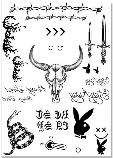 an image of tattoos and other things on the back of a sheet of stickers