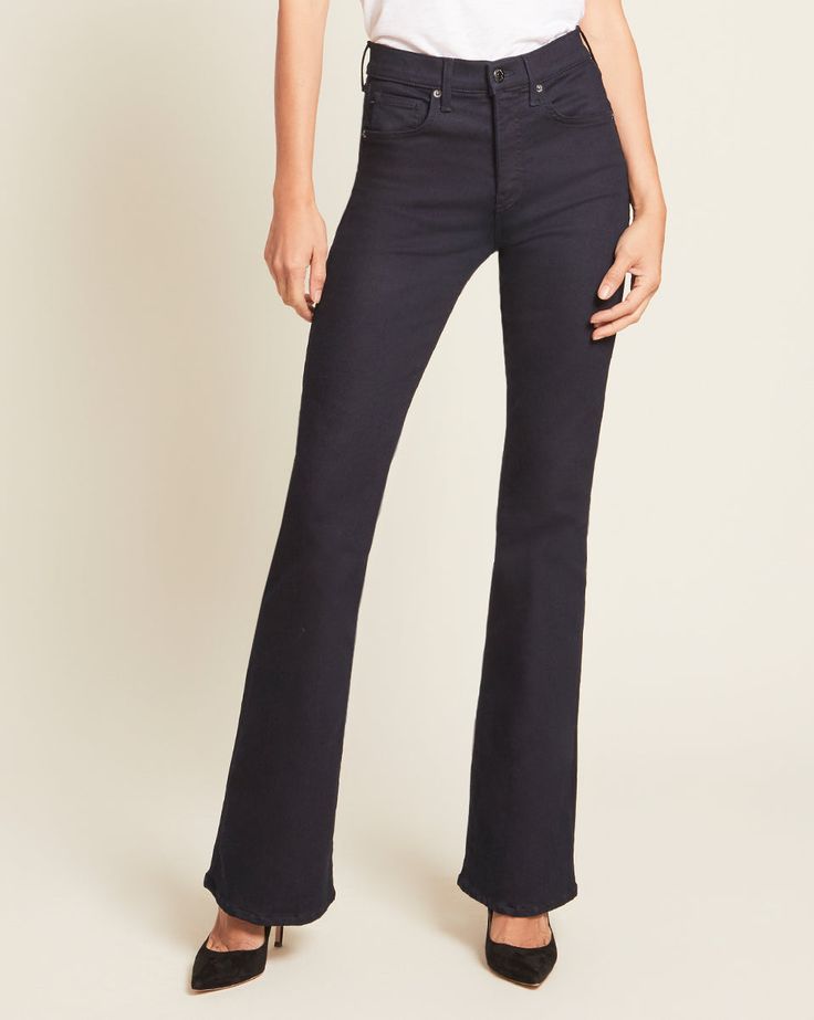 In a sophisticated dark wash, the Beverly jean features a high-rise waist that is fitted through the hips and thighs with a subtly flared leg. High quality stretch denim offers a flattering look with a flexible fit. Tuck in any of our tops and add sky-high heels for an elongating silhouette. FIND YOUR FIT Not sure of your fit? Check out our Fit Guide to explore our rises and hero styles. Chic Dark Wash Stretch Flares, Elegant Mid-rise Dark Wash Flare Jeans, Chic High Rise Flares For Workwear, Veronica Beard, Sky High, Black 7, Fit Check, Crew Neck Tee, Black Tee