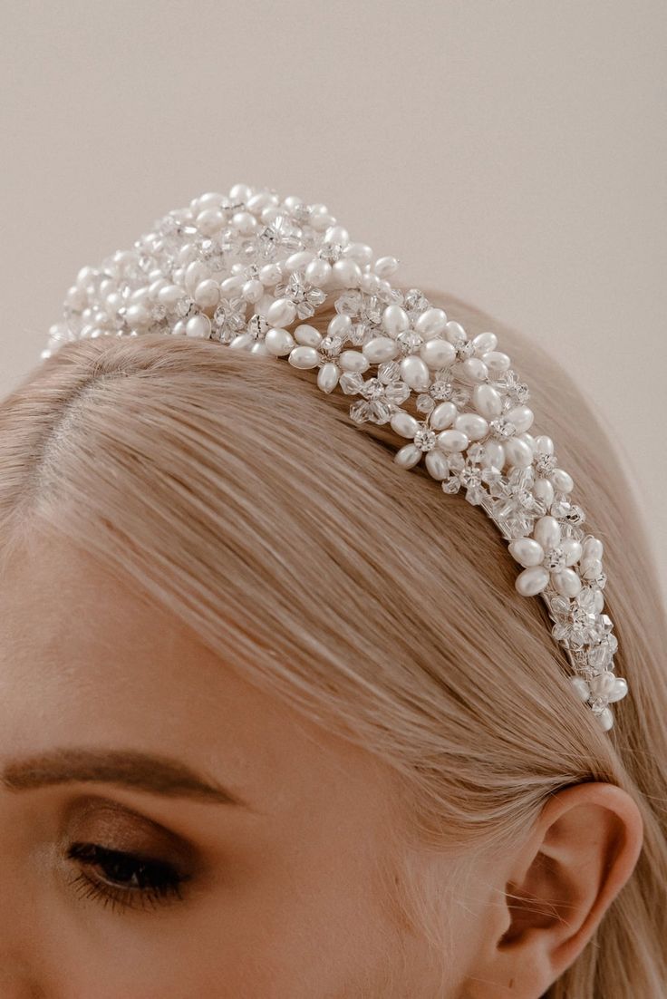 Pearl Regalia Headband Elevate your bridal hairstyle with Pearl Regalia Headband, featuring clear glass and pearls. This accessory adds a touch of timeless elegance to any wedding day look, with delicate detailing that sparkles in the light. Whether you're wearing your hair up or down, this headband is the perfect finishing touch to complete your bridal ensemble. Pearl Hairstyles Wedding, Pearl Hairstyles, Bridal Headbands, Veil Headpiece, Hair Up Or Down, Heirloom Wedding, Bridal Accessories Jewelry, Wedding Shower Gifts, Bridal Hairstyle