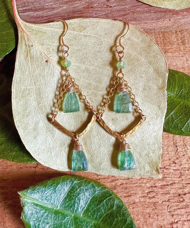 Gold filled dangle earrings with kyanite and chalcedony gemstones Fine Green Dangle Jewelry, Green Gemstone Hoop Earrings As Gift, Green Gemstone Hoop Earrings For Gift, Gold Dangle Earrings With May Birthstone, Gold May Birthstone Dangle Earrings, Gold Dangle Earrings For May Birthstone, Green Chandelier Earrings For Anniversary, Yellow Gold Jewelry With Matching Earrings For May Birthstone, Green Gemstone Hoop Earrings In Fine Jewelry Style