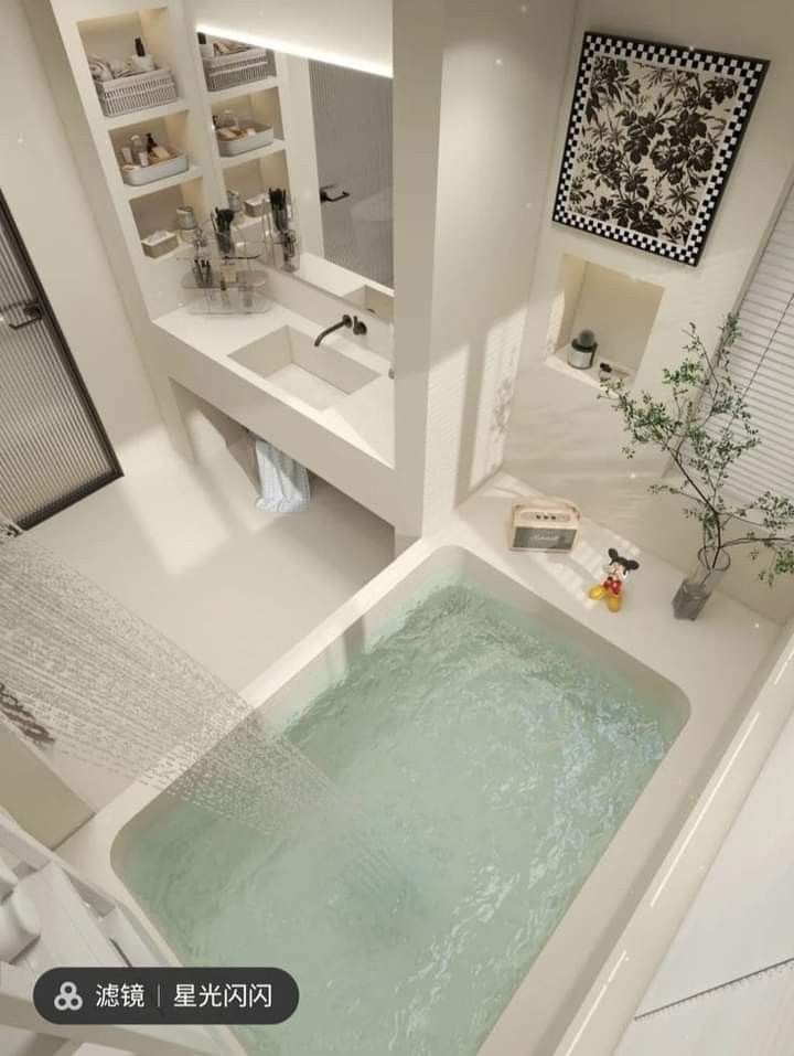 a bath tub sitting inside of a bathroom next to a sink