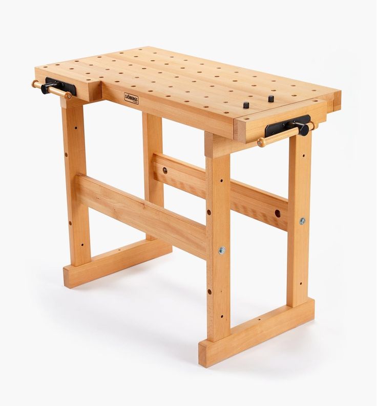 a wooden workbench sitting on top of a white background