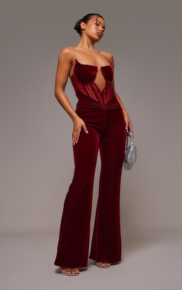 Take the stress out of weekend styling with this unreal cherry red velvet corset bandeau ruched jumpsuit. Brought to you in a cherry red velvet material with a bandeau style and ruched detailing, you really can't go wrong with this jumpsuit doll. Style with clear strap heels and gold accessories for a look that will have eyes on you for all the right reasons.   Length approx 154cm/60.5 (Based on a sample size UK 8)   Model wears size UK 8/ EU 36/ AUS 8/ US 4   Model Height - 5ft 6 Ruched Jumpsuit, Formal Jumpsuits, Bandeau Jumpsuit, Xmas Outfit, Burgundy Jumpsuit, Clear Strap Heels, Velvet Corset, Formal Jumpsuit, Velvet Jumpsuit