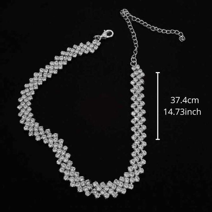 The stones are set in a precious silver-plated metal, and the necklace is designed to gracefully encircle the neck. Top layer: Electroplating for a brilliant finish Material: Silver, Alloy, Metal Sparkling Rhinestones: Full rhinestone water diamond Size: 37.4cm - *14.73inch Adjustable Size: With an extension chain of up to 10cm (3.94 inches). Hypoallergenic: Safe for sensitive skin. Gender: Female Age: Adult Brand Name: NoEnName_Null Product ID: CJLX118897201 Disclaimer: Actual colors may vary. Silver Necklace With Bling For Gift, Silver Bling Necklace For Gift, Silver Sparkling Rhinestone Necklace For Gift, Formal Silver Alloy Bridal Necklace, Silver Diamond Rhinestone Necklace With Bling, Silver Sparkling Diamond Rhinestone Necklace, Silver Alloy Rhinestone Necklace For Wedding, Silver Rhinestone Necklace For Wedding, Silver Diamond Chain Necklace With Bling