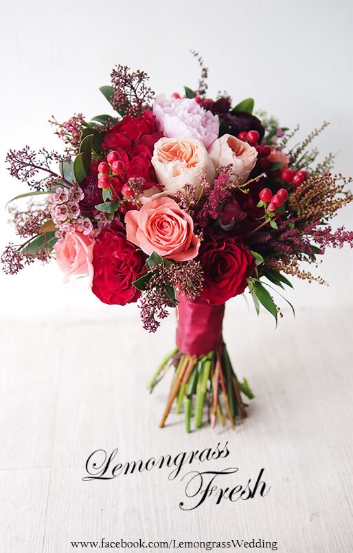 a bouquet of red and pink flowers on a white background with the words lemongrass fresh