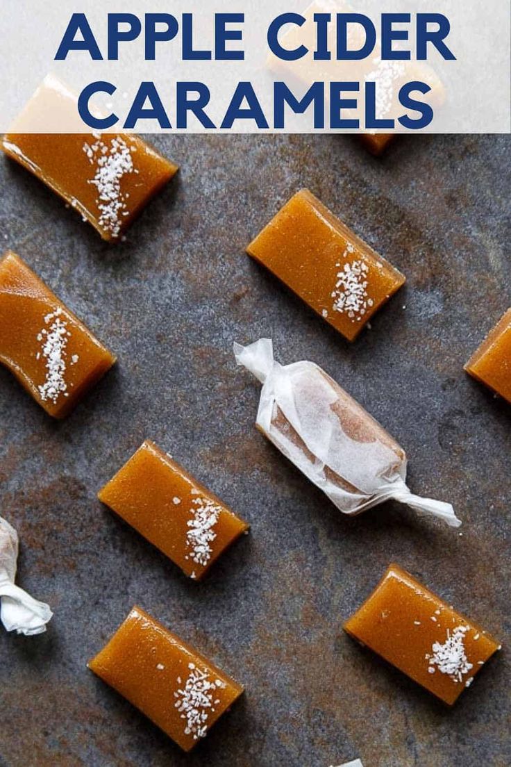 several pieces of caramel with white sprinkles on them sitting on a table