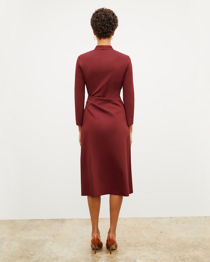 Carly Dress - Stretch Crepe :: Maroon – M.M.LaFleur Workwear Midi Dress With Pleated Back And Fitted Bodice, Classic Ruched Midi Dress For Work, Workwear Dress With Pleated Waist And Fitted Bodice, Fall Ruched Maxi Dress For Work, Fitted Maxi Dress With Pleated Back For Work, Pre-draped V-neck Dress For Work, Elegant A-line Wrap Dress For Date Night, Fitted Pre-draped Viscose Dresses, Fitted Draped Maxi Dress For Fall