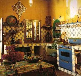 an old fashioned kitchen with colorful tiles on the walls