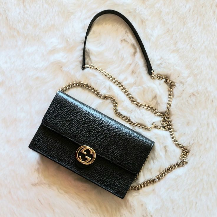 Brand New Never Used Authentic Gucci Mini Icon Black Pebbled Leather Gold-Tone Interlocking G Logo Chain Strap Convertible Wallet Clutch Style: 510314 Made In Italy Length: 8 In Height: 5 In Depth: 1.5 In 23"-Drop Removable Chain Shoulder Strap In Gold Black Fabric Interior Lining One Main Compartment One Inside Zip Compartment 18 Credit Card Slot Compartments With Serial Number Embossed Inside Gold-Tone Hardware Comes In The Box With Care Cards And Dust Bag Gucci Luxury Wallet On Chain With Chain Strap, Classic Gucci Wallet On Chain, Classic Gucci Leather Wallet On Chain, Gucci Leather Wallet On Chain For Formal Use, Gucci Leather Wallet On Chain For Formal Occasions, Gucci Evening Wallet On Chain With Chain Strap, Gucci Wallet On Chain For Evening With Chain Strap, Elegant Gucci Wallet On Chain With Chain Strap, Gucci Wallet On Chain With Chain Strap For Evening