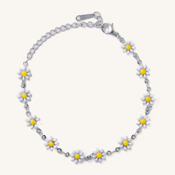 This fun silver daisy bracelet is a crowd favorite! Don't miss out on this cutie. Waterproof stainless steel 6 inches with 2.5 inch extender Silver Flower Jewelry For Friendship, Silver Bracelets For Spring, Adjustable Silver Daisy-shaped Jewelry, Adjustable Silver Daisy Jewelry, Spring Silver Bracelet Jewelry, Silver Bracelets For Spring Gift, Silver Bracelet For Spring Gift, Cute Silver Jewelry For Spring, Cute Silver Spring Jewelry