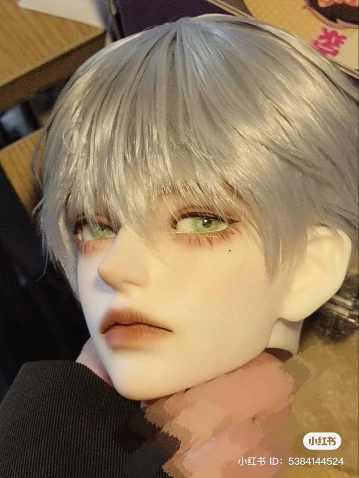 a wig with grey hair and green eyes