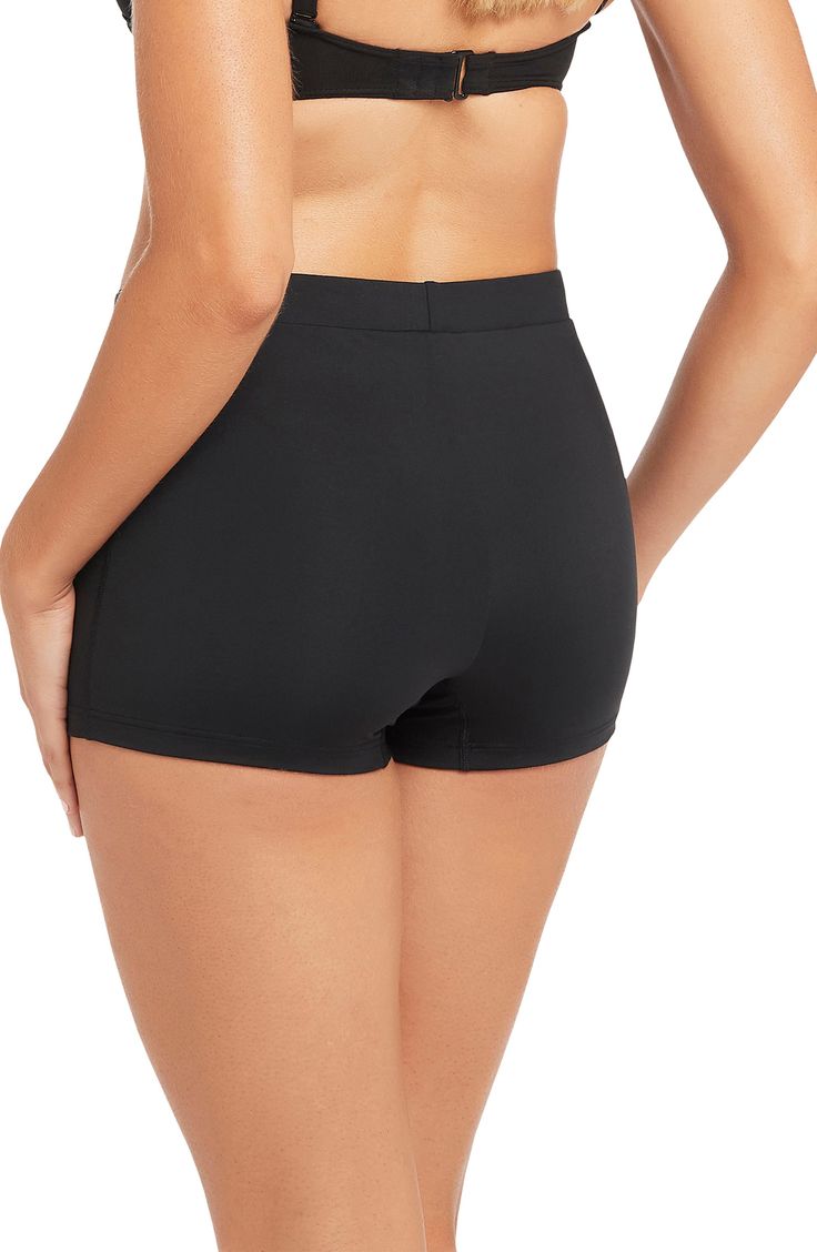 Sporty and sleek, these shapely swim shorts accentuate your curves while providing ample coverage for all-day swimming. Full back coverage 85% recycled polyester, 15% elastane Hand wash, dry flat Imported This product meets Nordstrom Sustainably Sourced Materials criteria: contains at least 50% sustainably sourced materials Solid Color Swim Dress With Built-in Shorts, High Stretch Swimwear With Moderate Back Coverage, High Waist Swimwear With Built-in Shorts, Poolside Swim Skirt With Built-in Shorts, Swim Skirt With Built-in Shorts For Swimming, Stretch Swim Dress With Built-in Shorts, Workout Swimwear With 4-way Stretch, Short Nylon Swim Skirt With Built-in Shorts, Compression Swim Trunks With Built-in Shorts