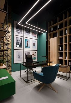 an office with green walls and furniture in the center, along with shelves full of books