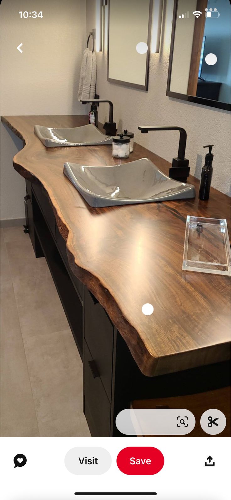 a bathroom with two sinks and mirrors on the wall above them is shown in an instagram