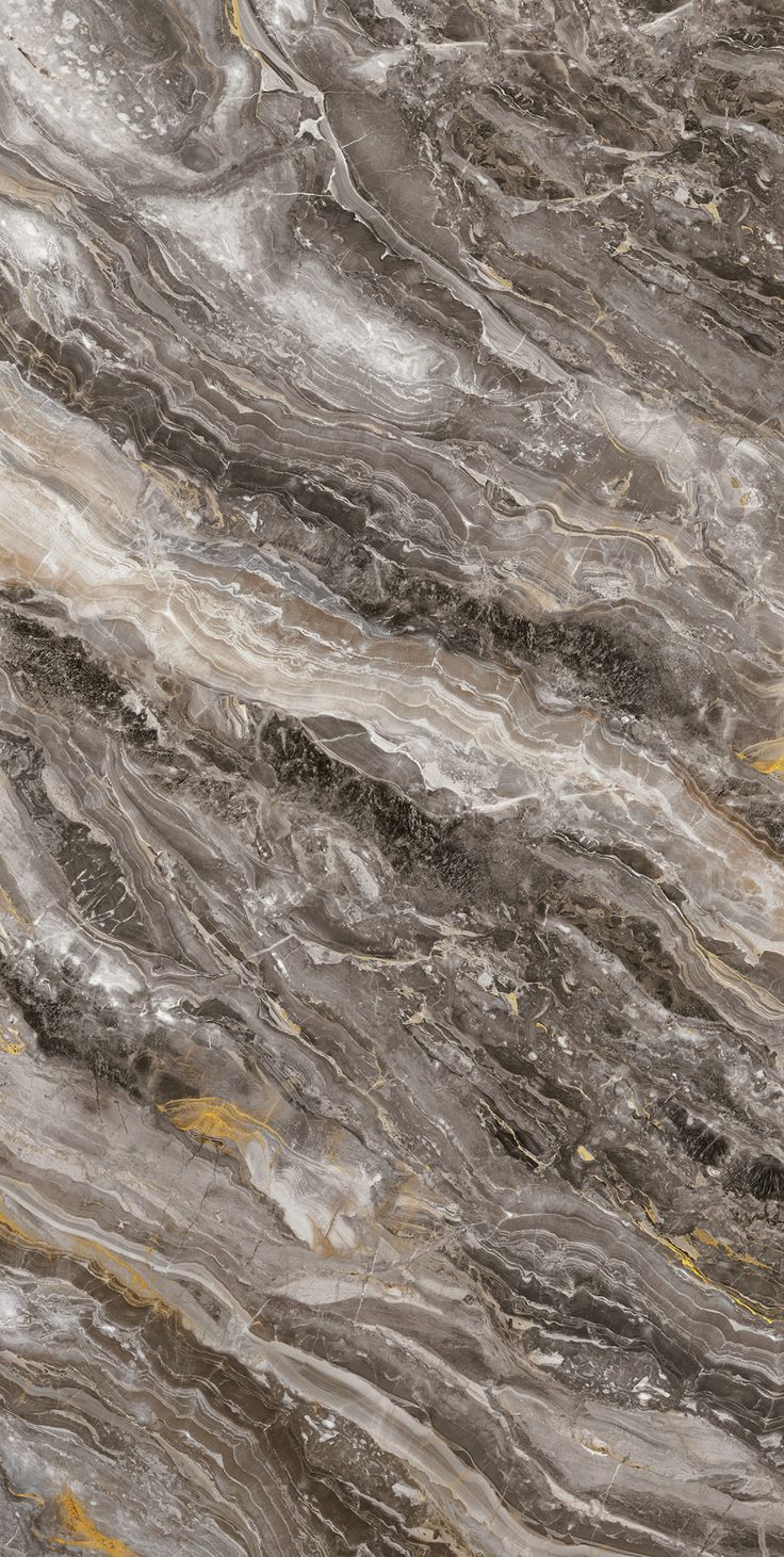 a marble counter top with grey and white colors