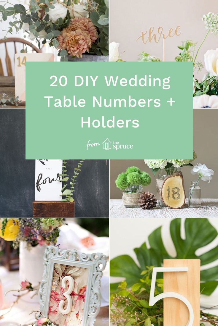 wedding table numbers and holders with greenery, flowers, and wooden signs on them