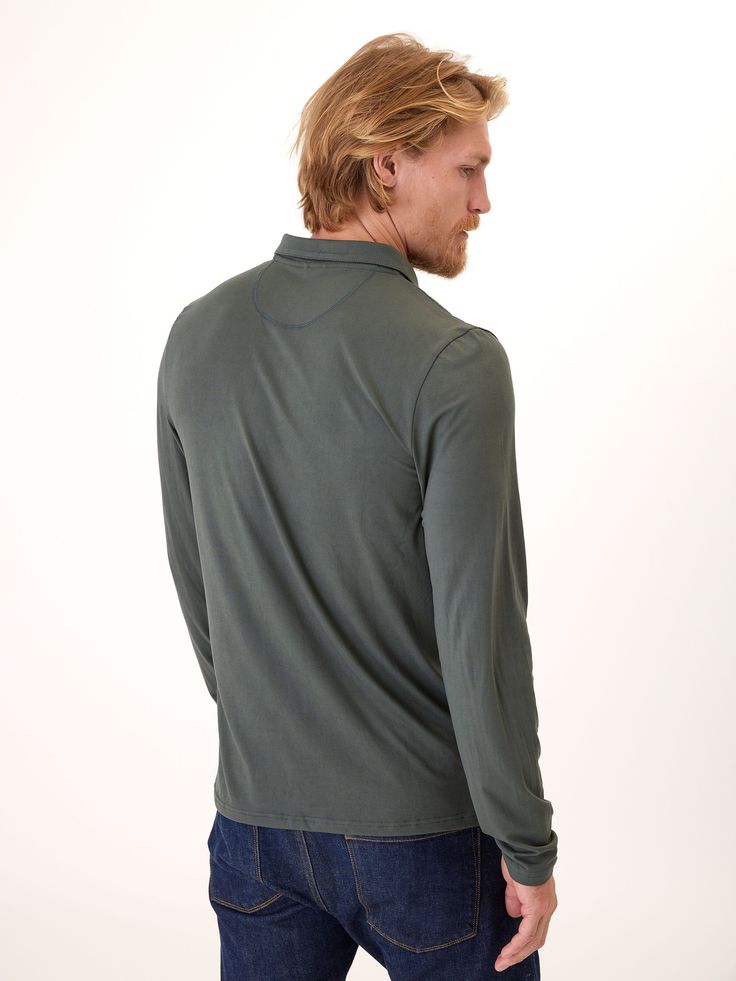 Introducing Luxe Jersey Long Sleeve Polo: crafted with an ultra-stretchy, luxe jersey fabric for uncompromising comfort and style. The classic polo style pairs easily with any pant an effortless yet sophisticated look. Casual Stretch Polo Shirt For Work, Collared Stretch Tops For Business Casual, Stretch Collared Tops For Business Casual, Classic Stretch Polo Shirt In Solid Color, Fitted Casual Polo Shirt For Fall, Classic Stretch Polo Shirt, Fitted Polo Shirt For Fall, Classic Polo Collar Tops With Stretch, Fitted Polo Shirt With Seamless Collar For Fall