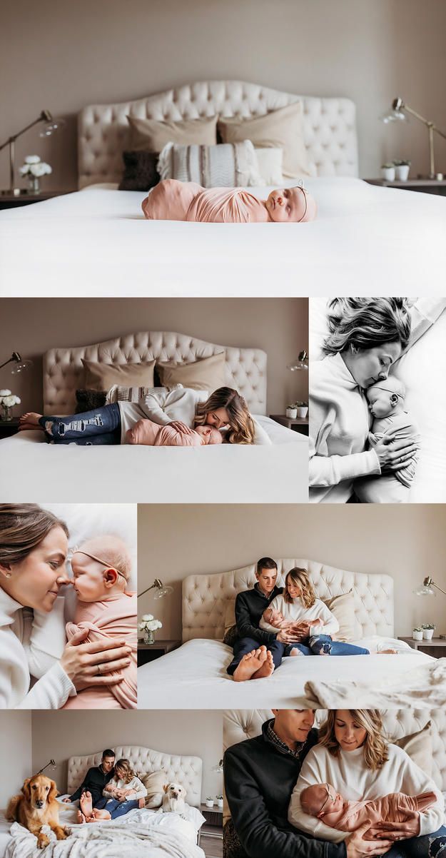 people are sitting on the bed and one is holding a baby while another person sleeps