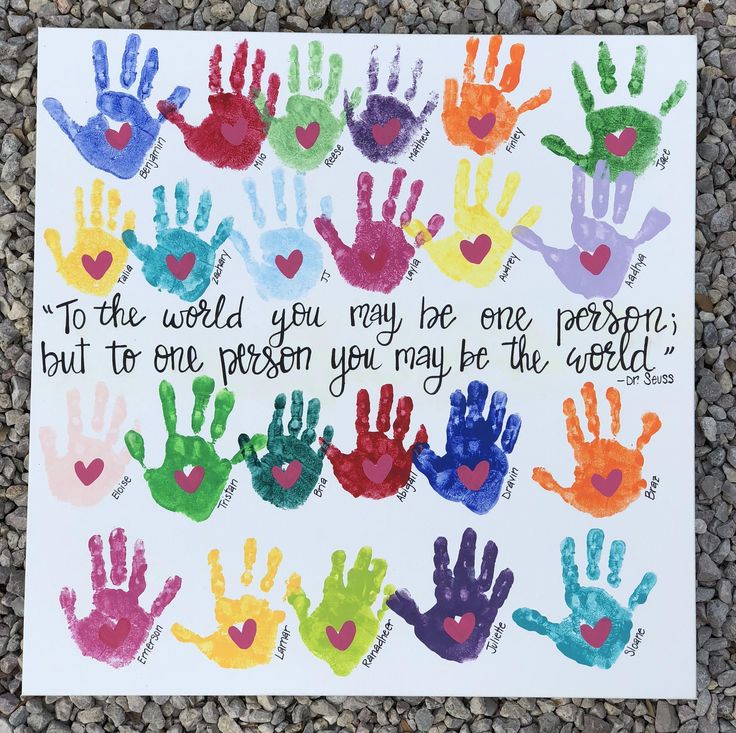 a handprinted card that says to the world you may be one person, but to one person you may be the world