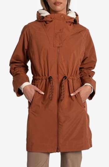 Travel confidently and comfortly in wet weather with this waterproof rain jacket designed for easy packing and breathability. 35" front length; 38" back length (size Medium) Drawcord-toggle hood Drawcord-toggle waist Waterproof Lined 100% polyester Machine wash, tumble dry Imported Casual Windproof Parka For Travel, Waterproof Nylon Outerwear For Fall, Solid Weatherproof Windbreaker For Travel, Casual Nylon Parka For Rainy Season, Utility Outerwear With Functional Drawstring For Outdoor Activities, Travel Weatherproof Windbreaker, Utility Weatherproof Parka For Travel, Weatherproof Utility Parka For Travel, Solid Nylon Raincoat For Fall