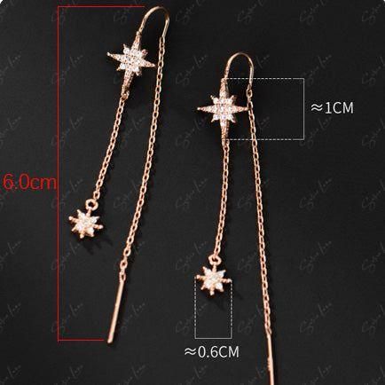 These elegant star dangle drop earrings ear threader features cable chain threaders with cubic zirconia stars dangle drop, made of solid 925 sterling silver with platinum or rose gold plating. Add these elegant star dangle threader to your everyday fine jewelry collection or as gift for your love one. Experience the luxury and sparkle of these threader earrings every day. Made from high-quality materials and featuring dazzling cubic zirconia stars, these earrings are sure to elevate your style a Elegant Dangle Earrings With Star Charm, Cubic Zirconia Star Charm Dangle Jewelry, Cubic Zirconia Dangle Jewelry With Star Charm, Sterling Silver Tarnish Resistant Dangle Threader Earrings, Sterling Silver Tarnish-resistant Dangle Threader Earrings, Tarnish Resistant Sterling Silver Dangle Threader Earrings, Tarnish-resistant Sterling Silver Dangle Threader Earrings, Rose Gold Star-shaped Pierced Jewelry, Elegant Star-shaped Jewelry With Ear Wire